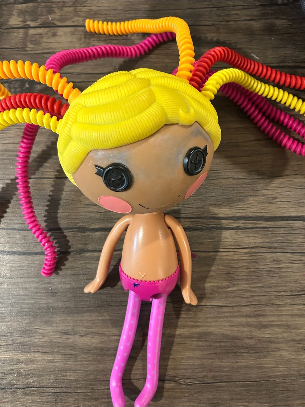 Curly Yellow-Haired Kids Fashion Doll with Pink Accents